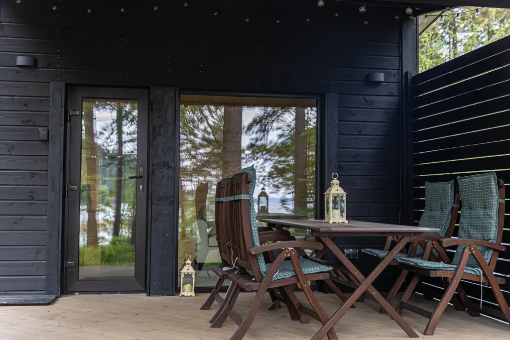 Стильный дом на берегу Ладожского озера с панорамным видом