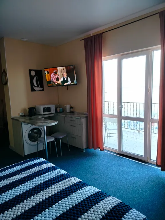 Комната с видом на море со всеми удобствами