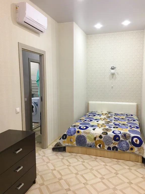 Четырехместная однокомнатная квартира с балконом в центре