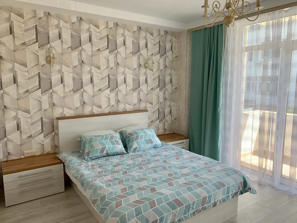 Новые апартаменты c террасой и видом на город и море