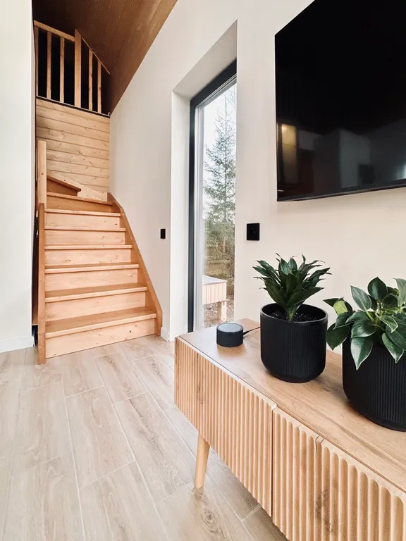 Новый панорамный барнхаус с сауной на лесном участке