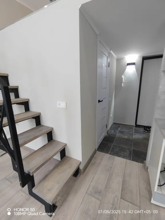 Шикарная двухуровневая студия в центре