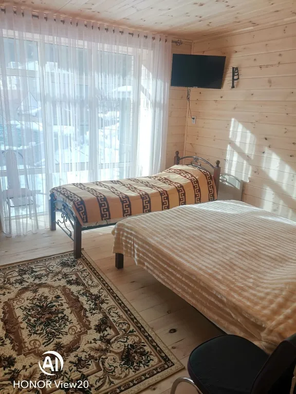 Уютный 3-х этажный коттедж в центре Домбая