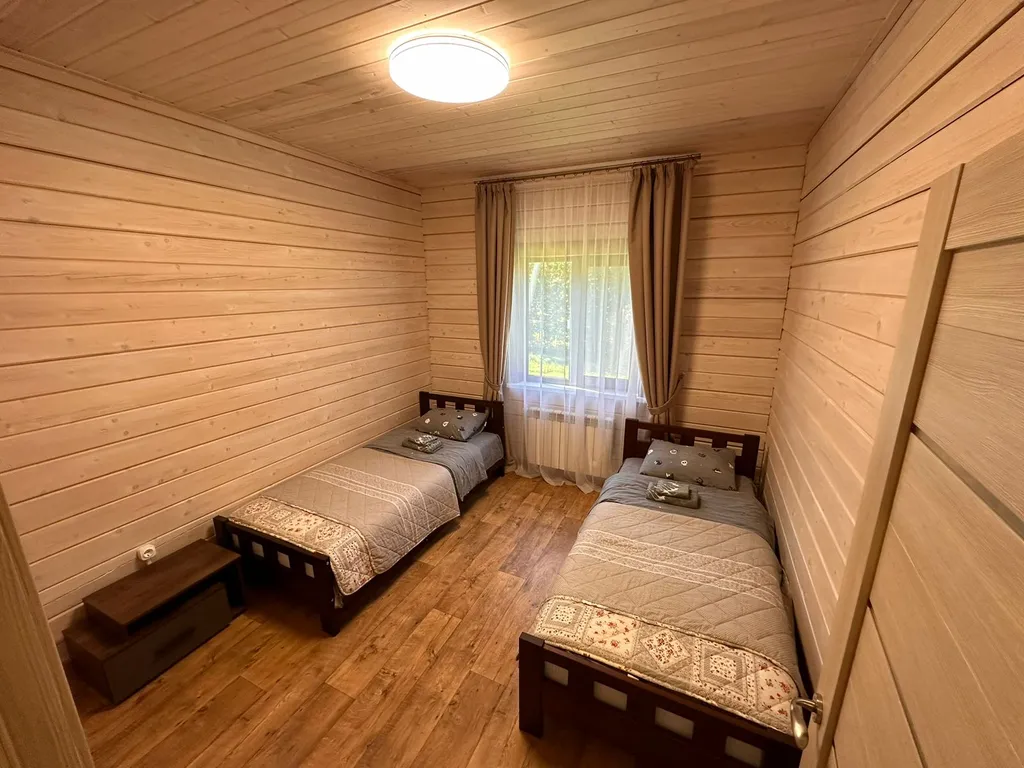 Тёплый коттедж на первой линии озера Волго