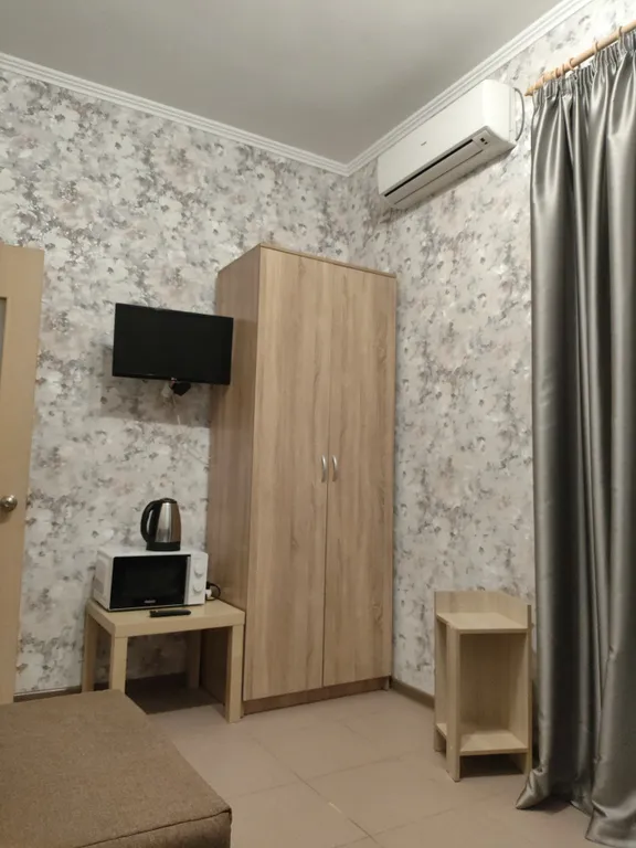 Семейный двухкомнатный номер с изолированными комнатами и с балконом