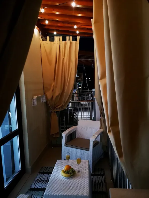 Студия комфорт с видом на горы и бассейнами во дворе