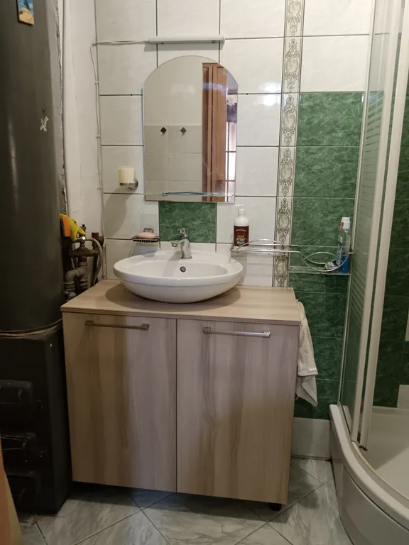 Часть дома с отдельным входом садом и парковкой