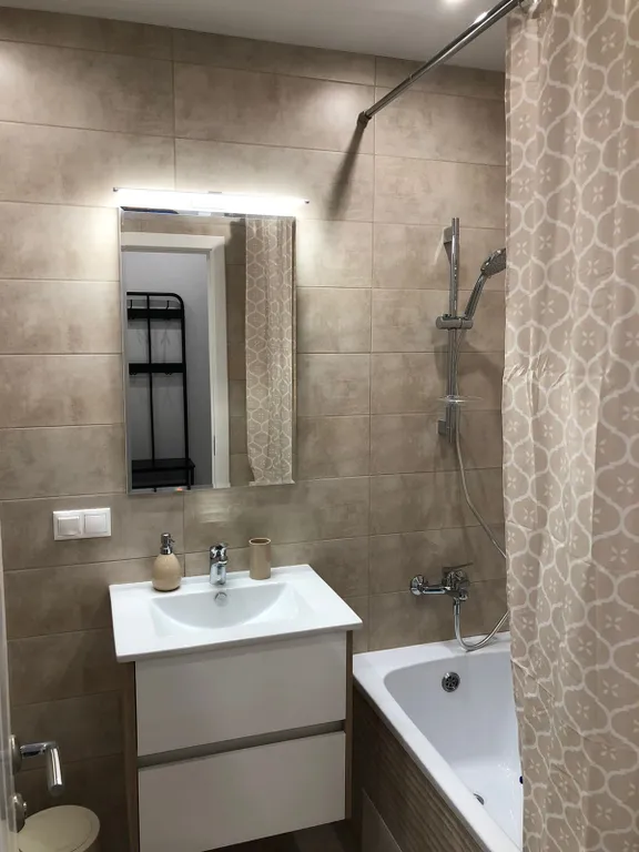 Уютная квартира с отдельной спальней в олимпийском парке