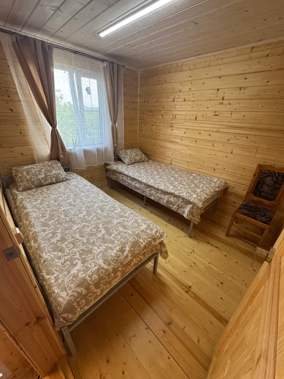 Уютный двухэтажный дом в окружении природы