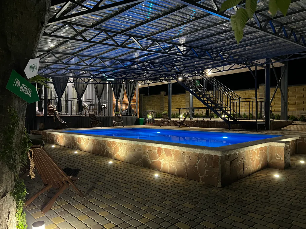 Домик в лесу у моря с верандой