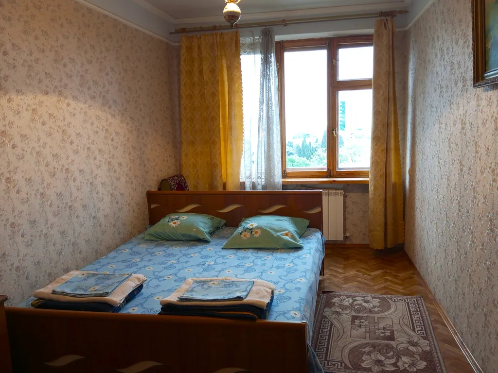 Квартира с мангальной зоной, гаражом и личным местом отдыха во дворе