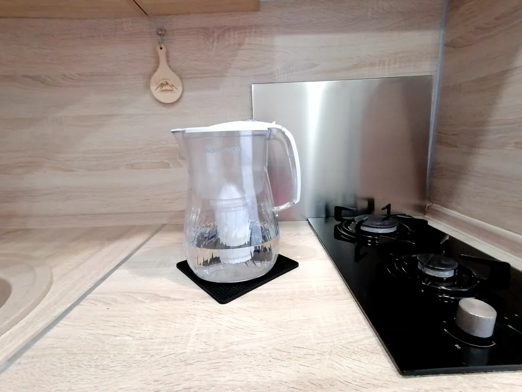 Уютная и тёплая квартира в центре города. Столовая расположена  в доме