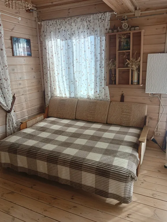 Домик на берегу Оки на территории сельской усадьбы Варежка