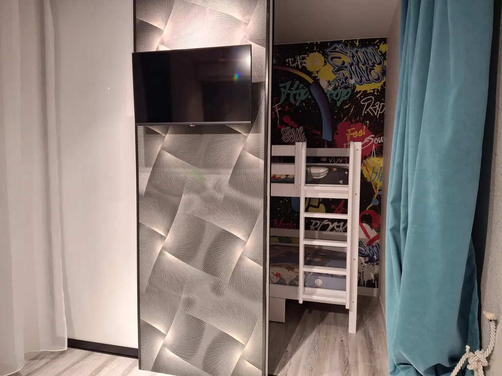 Семейный двухкомнатный люкс с балконом 15