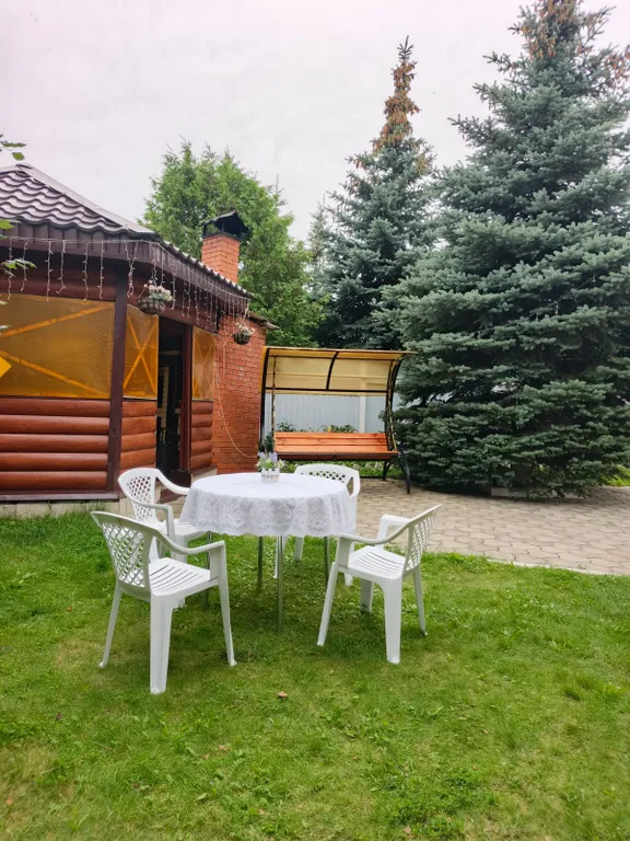 Дом коттедж в черте города