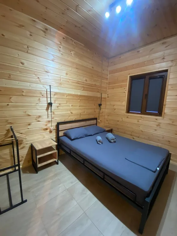 Деревянный домик Nur house с подогреваемым бассейном