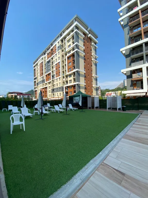 Студия с завораживающим видом и летним бассейном