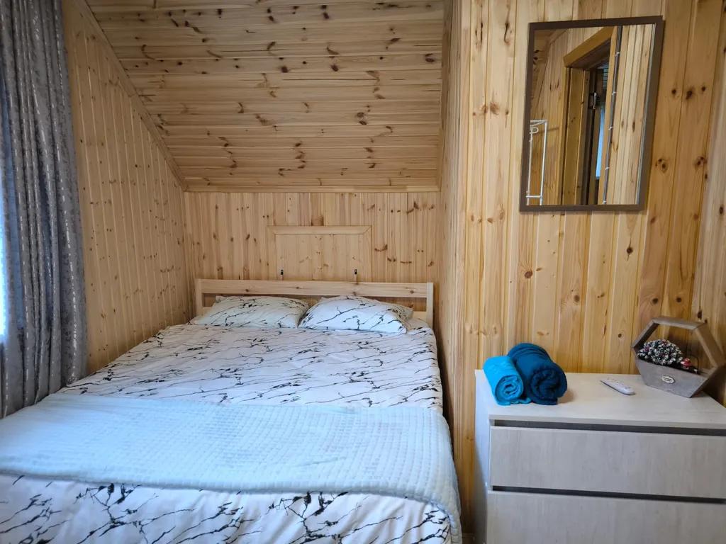 Новый бревенчатый дом в центре