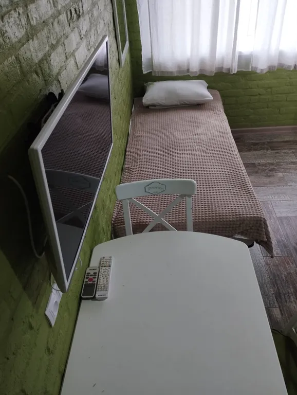 Уютный четырехместный номер с отдельными кроватями.