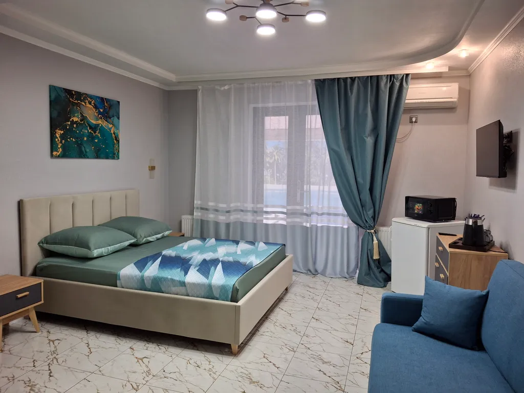 Большой четырёхместный люкс с выходом на бассейн 16