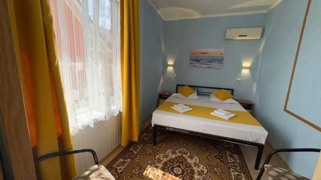 Двухкомнатный номер для 4-х гостей и дополнительным местом