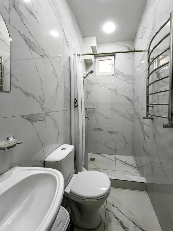 Апартаменты с отдельной спальней и кухней - гостиной