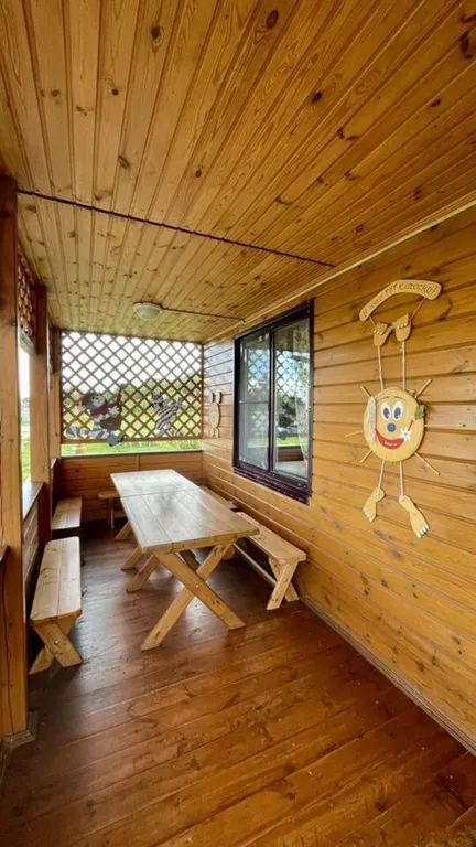 Домик на берегу Оки на территории сельской усадьбы Варежка