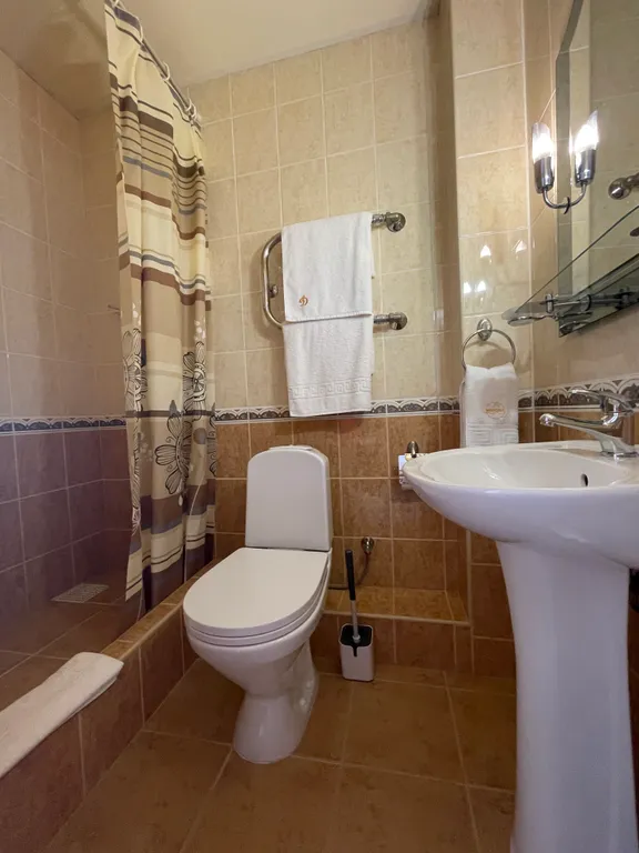 Уютный двухместный номер с двуспальной кроватью и видом на море