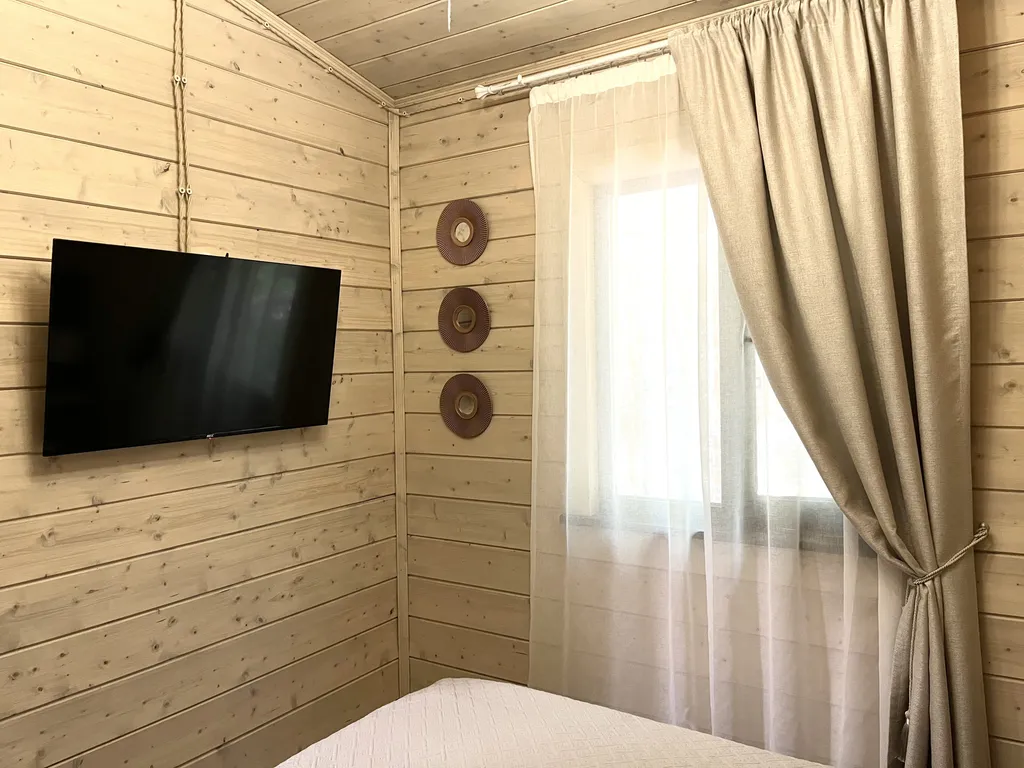 Коттедж Дизайнерский коттедж на берегу озера Волго на Селигере — Турбаза Чайка