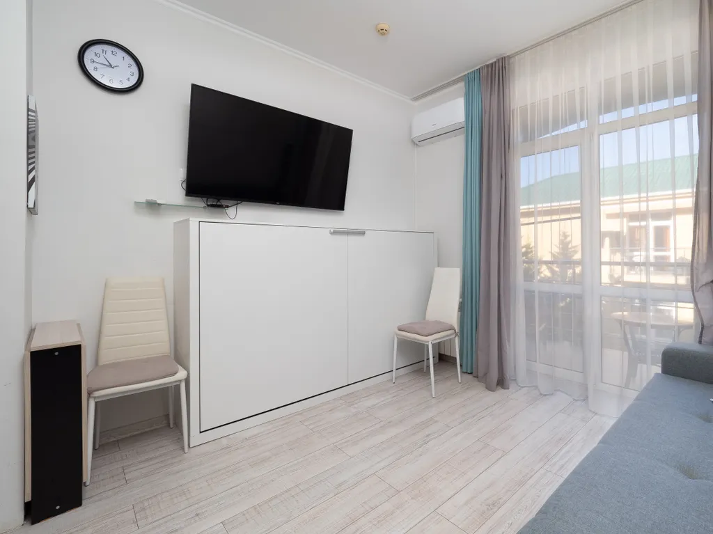 Квартира Квартира Светлая студия у моря с теплым бассейном — Сириус