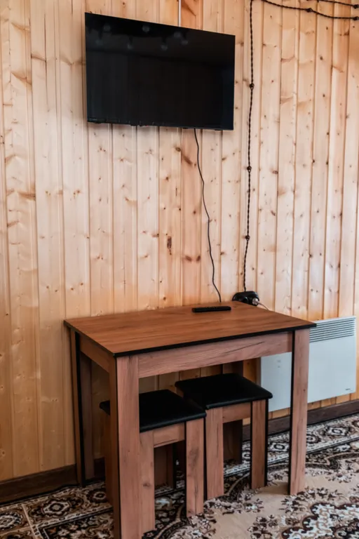 Домик у подножья горы Чегет