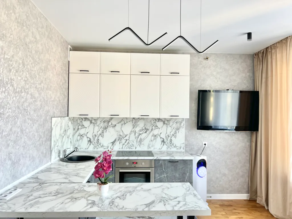 Новая квартира с прекрасными видами в центре города у канатной дороги