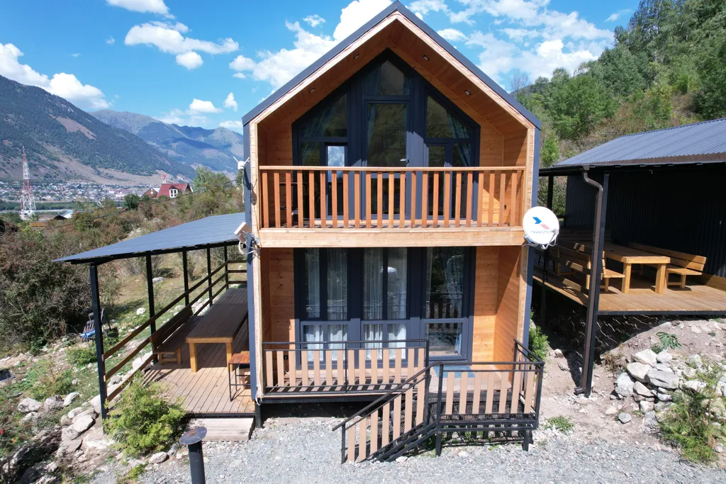 Дом в лесу с видом на горы Барнхаус Барс