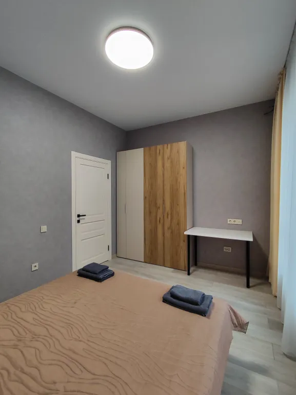 Двухкомнатная двухэтажная квартира в центре города