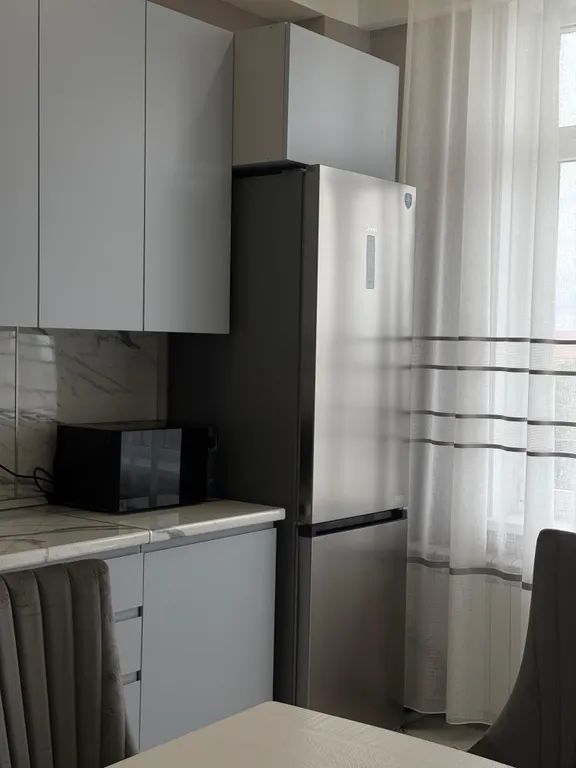 Уютная квартира в центре города рядом с фонтаном, с видом на город