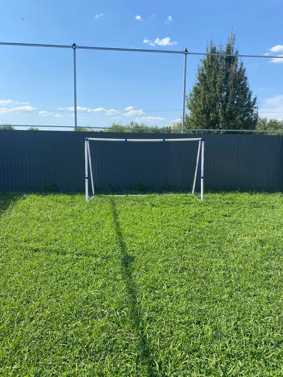 Частный дом с футбольным полем