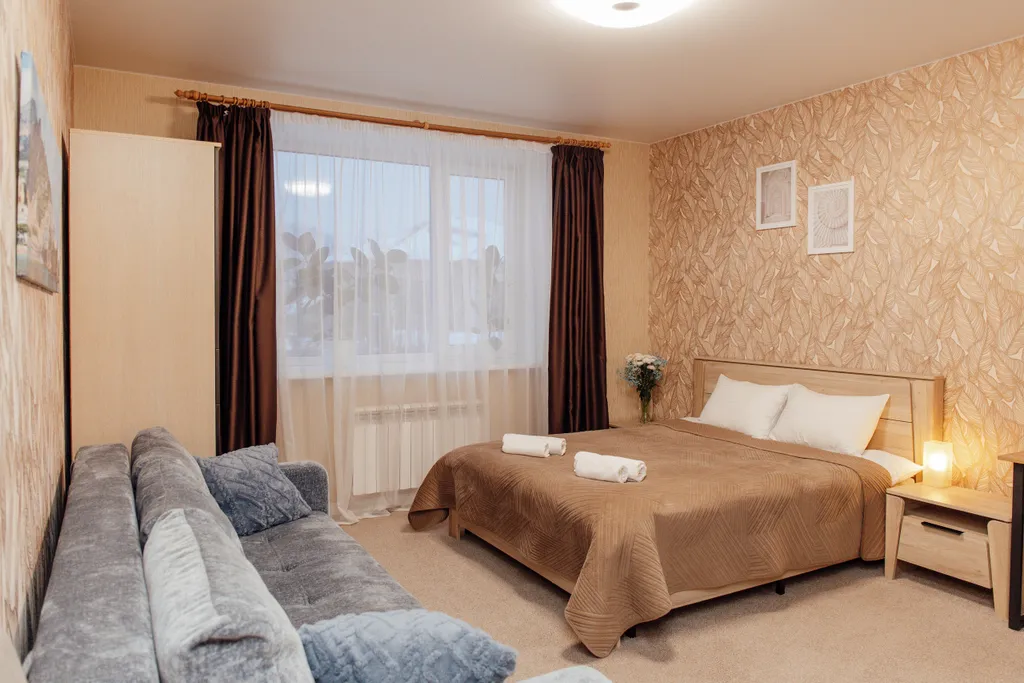 Семейный номер с двуспальной кроватью и раскладным диваном