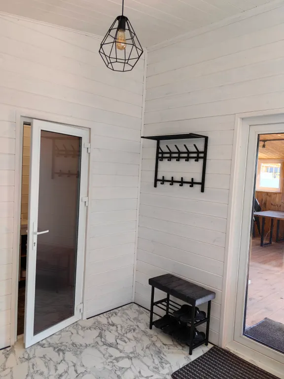 Дом на берегу озера с сауной и купелью