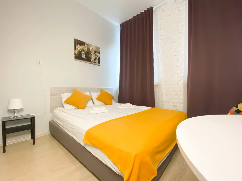 Уютные апартаменты-студио Солнечный Питер на Гончарной улице