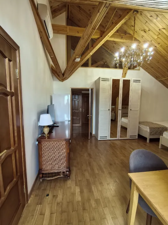 Четырехместный семейный номер с четырьмя кроватями в мансарде