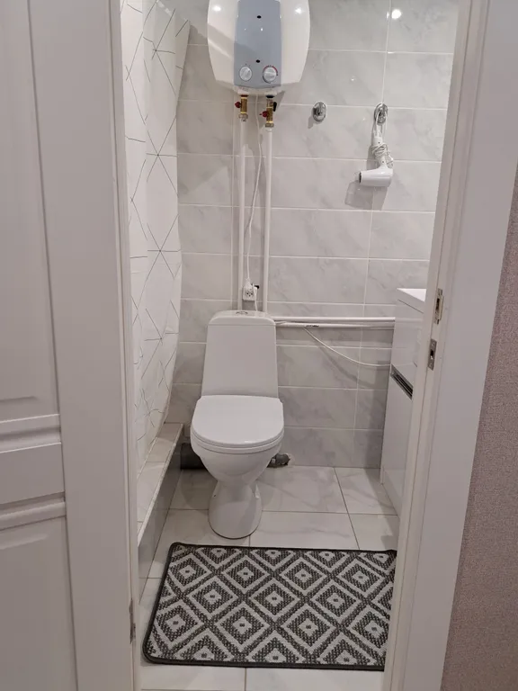 Стильная и уютная двухъярусная студия