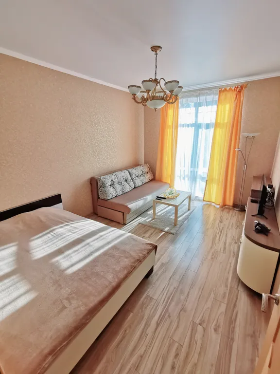 Уютная квартира с панорамными окнами близко к центру