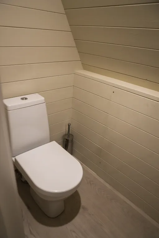 Нескучный треугольный дом Mökki с купелью