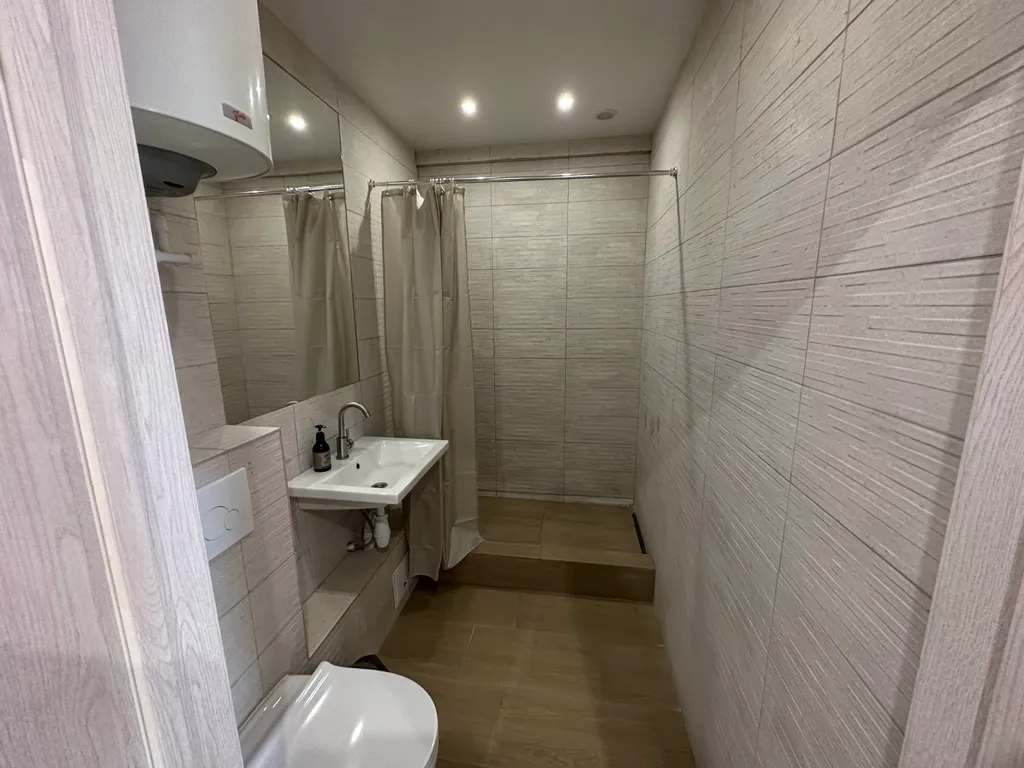 Двухэтажные апартаменты с балконом Столица 2313