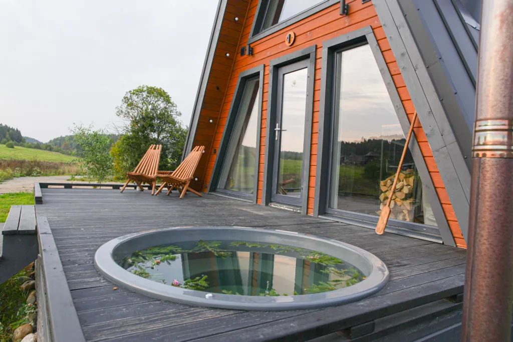 Дом Афрейм с подогреваемой купелью в террасе дома Лисичкино Карелия