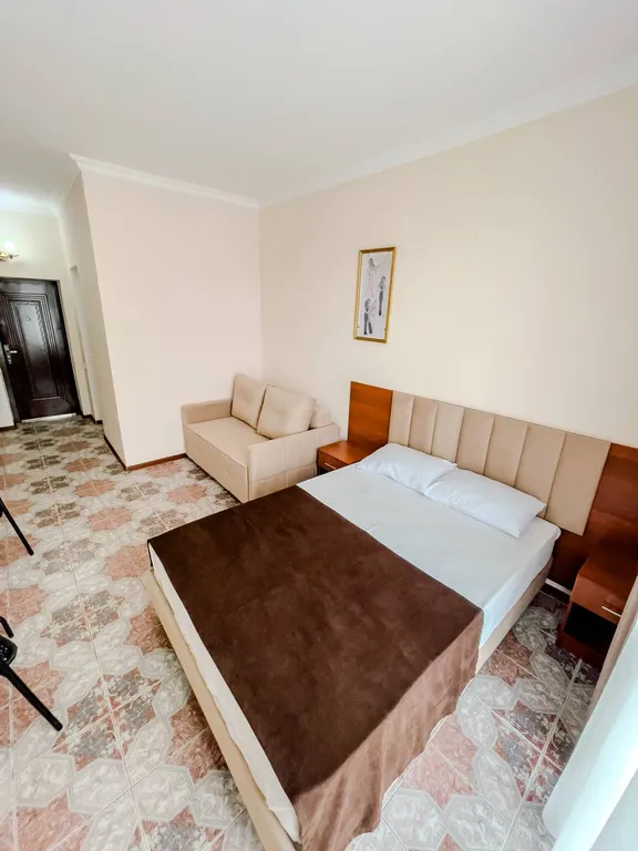 Трехместный номер с балконом