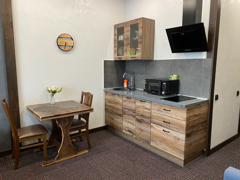 Уютные семейные апартаменты c видом на водоём и горы