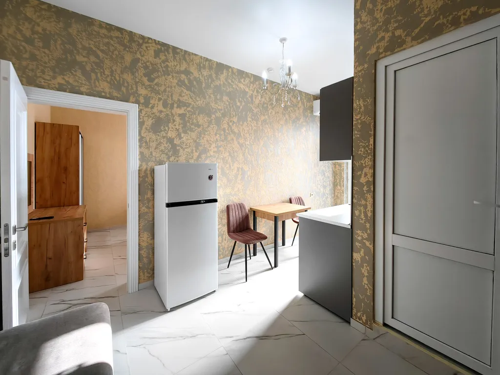 Апартаменты в светлых тонах с видом на горы