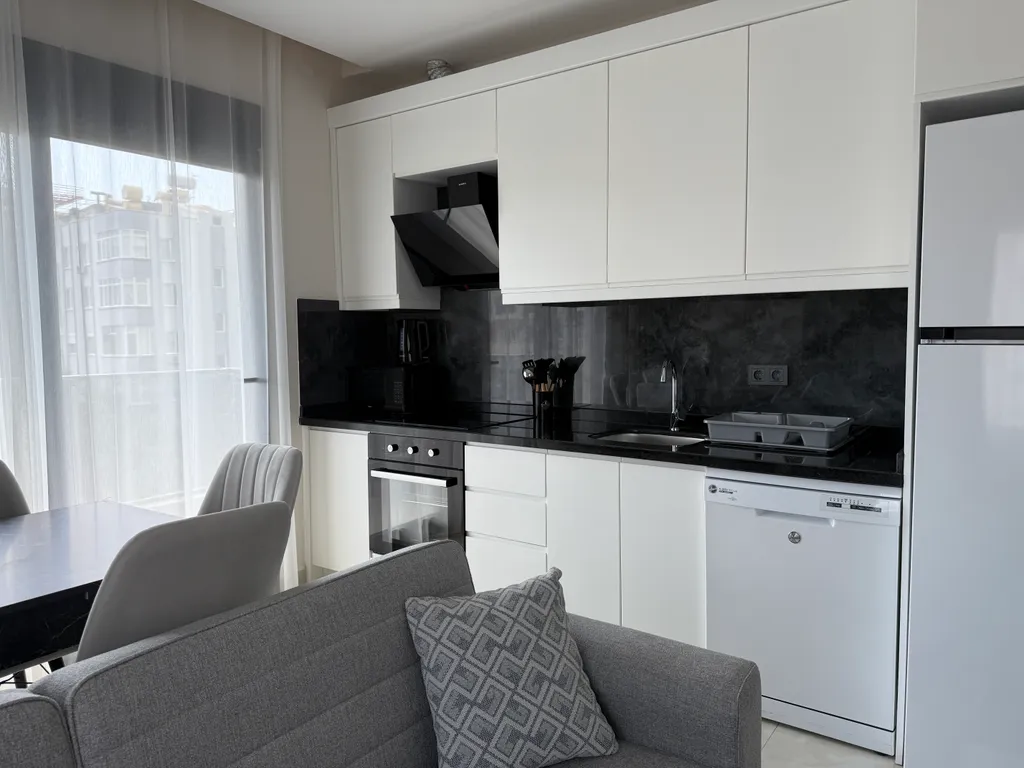 Новая квартира 2+1 в самом центре Махмутлара