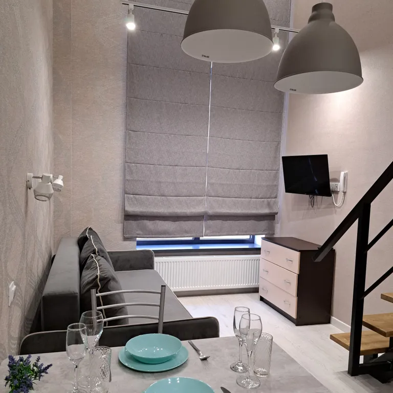 Стильная и уютная двухъярусная студия